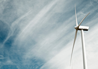 Wind mill and cloudy sky